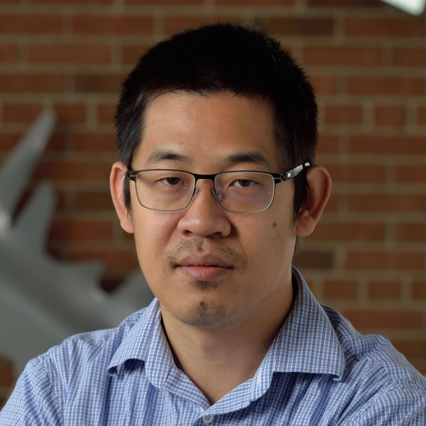 Professional headshot of Huan Lei