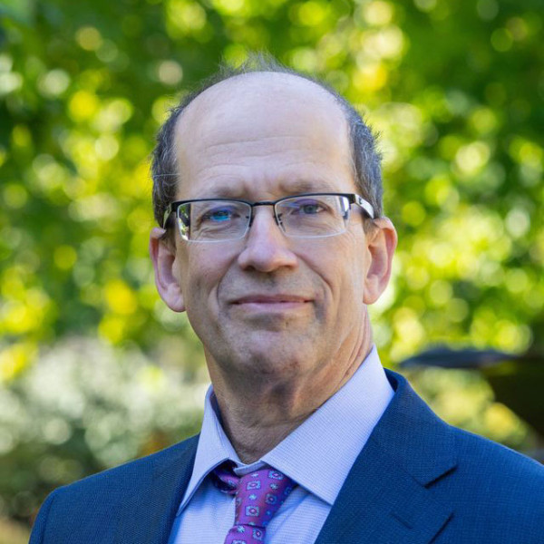 Professional headshot of Keith Promislow