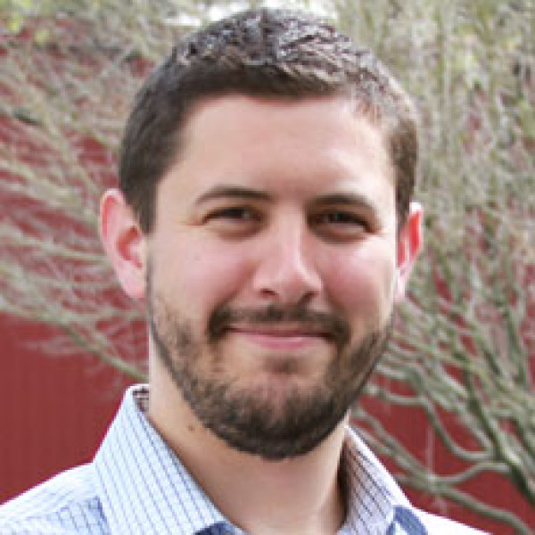 Professional headshot of Liam Stanton